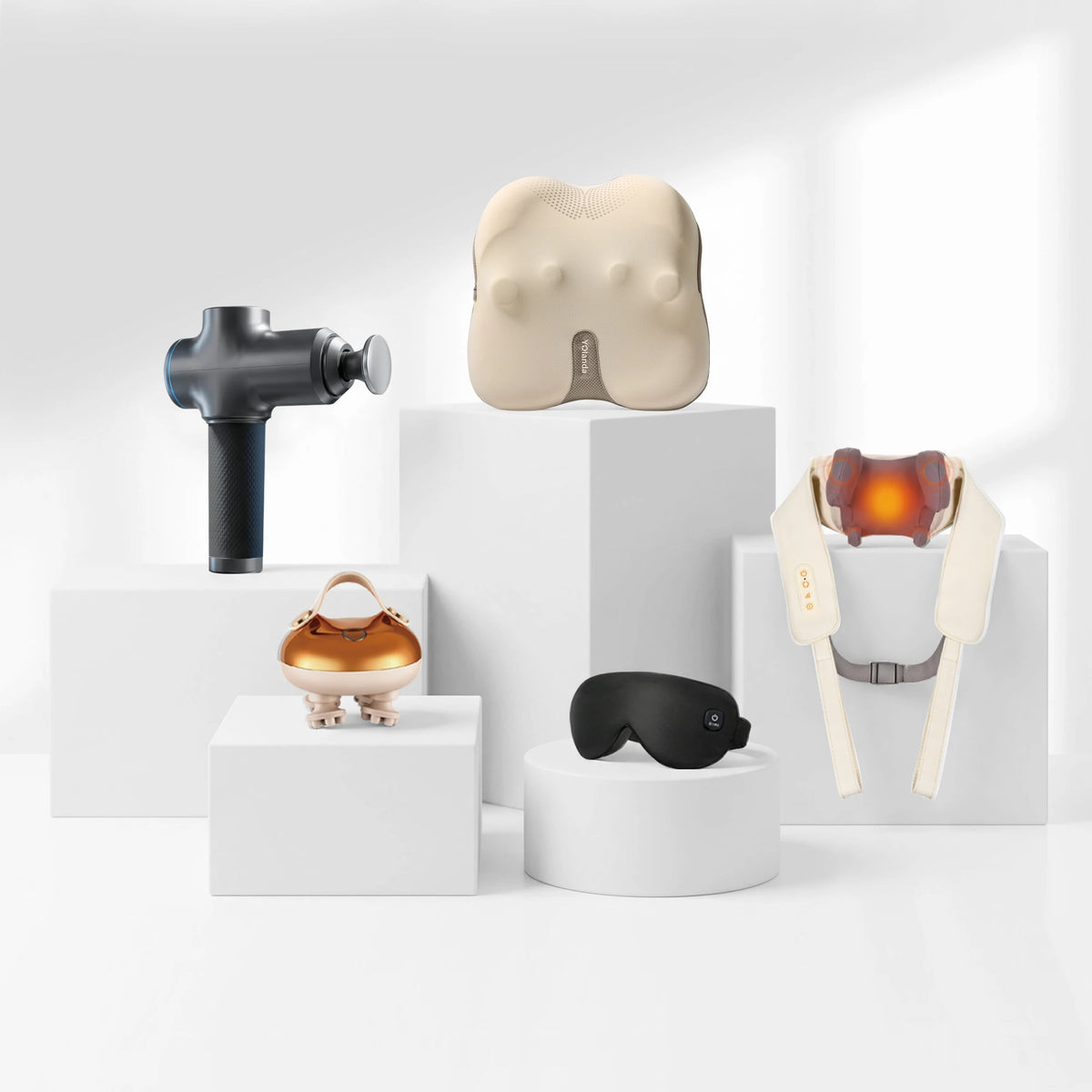 Yolanda collection of health recovery devices including massage gun, lumbar massager and heated eye mask